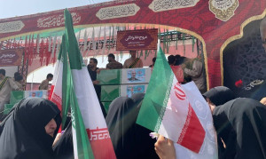 تابوت شهید سردار باقری به همراه همسر و دخترش